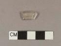 Colorless bottle glass folded rim fragment