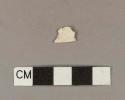 Unidentified refined earthenware body sherd; missing finished surface from both sides