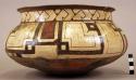 Ceramic vessel, polychrome, flared rim, flat base.