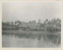 Waterfront with thatched structures