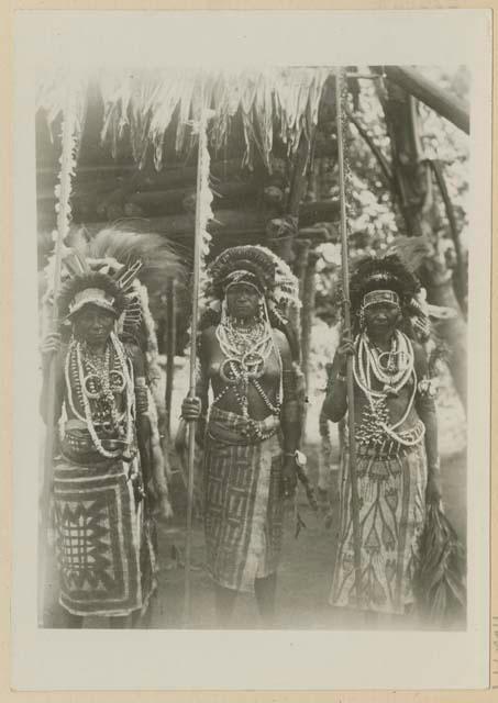 Women dressed to dance at the funeral of a chief