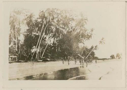 Coastal village, children on beach