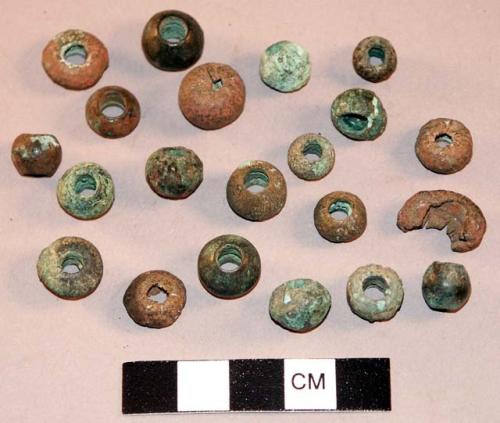 Copper beads or spindle whorls