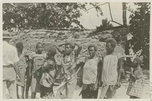 Group standing in front of a house