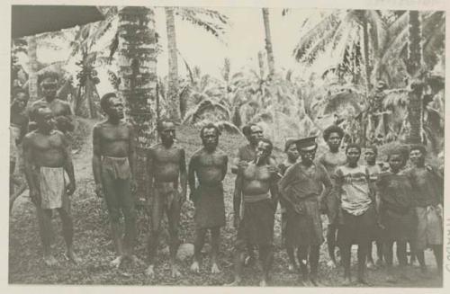 Group standing in front of trees