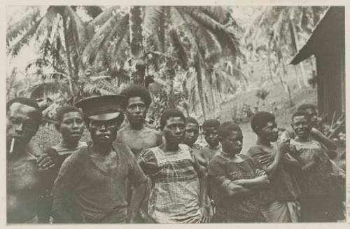 Group standing in front of trees