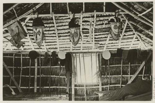 Interior of barrack room with dancing masks