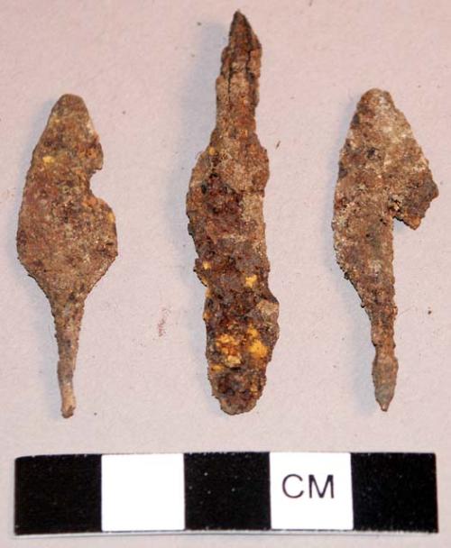 Three iron arrowheads