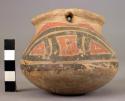 Double-necked polychrome pottery vessel