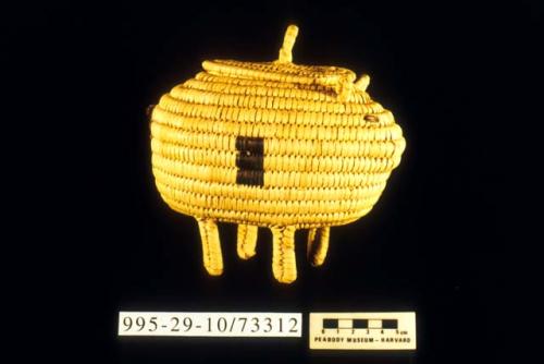 Coiled basketry standing pig (A) with lid (B)