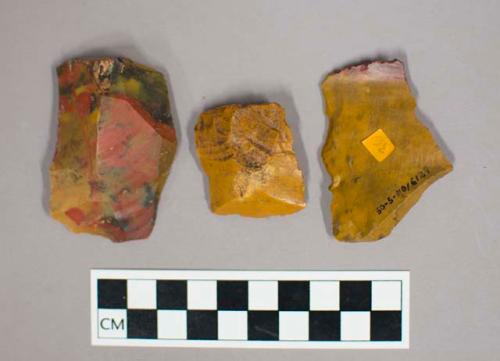 8 stone flakes of various types showing signs of use