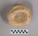 1 stone mortar (12.5 cm. diam.); 1 sepherical pestle of flint