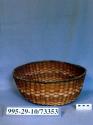 Large plaited wicker bowl with straight sides