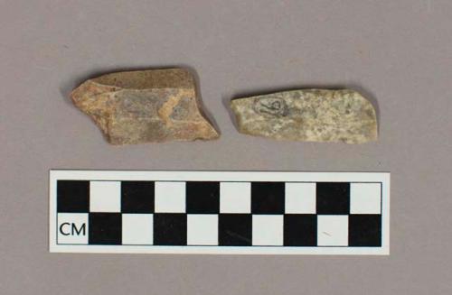 2 flint concave scaled ( B V) burins. " Upper" remnants showing that the re-edgi