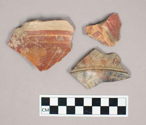 12 unclassified body sherds, large burnished ware tetrapod bowls