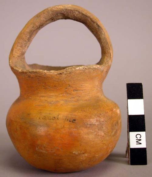 Small vessel of reddish yellow clay