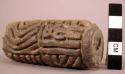 Buff clay West Coast Mexican cylinder seal with a deeply incised design.  Intact