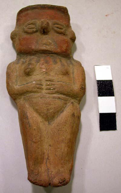 Small pottery female figure