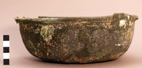 Bronze bowl or deep dish, some traces of textile