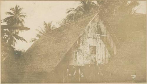 Building on stilts with thatched roof