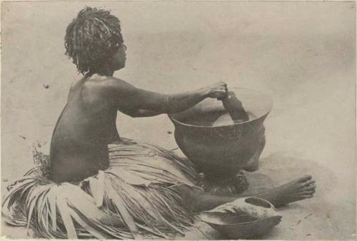 Person making cooking pot