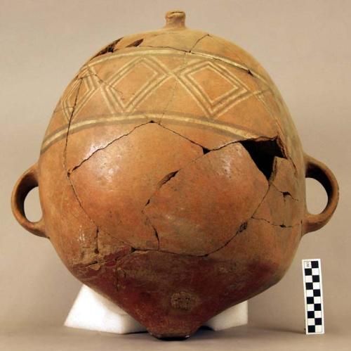 Ceramic jar, missing neck and rim, bell-shaped body, peaked base