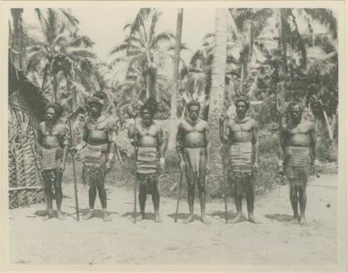 Group of chiefs wearing aprons made of pandanus fiber