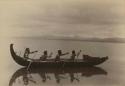 Four men in a canoe