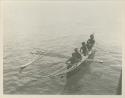 Men in outrigger canoe
