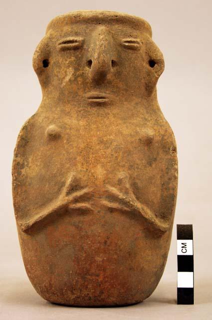 Terra cotta vase, grotesque human form