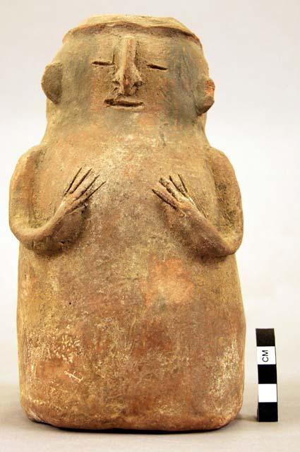 Terra cotta vase, grotesque human form