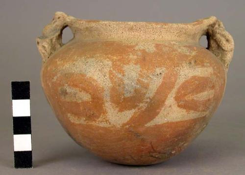 Pottery jar, with handle in shape of human figure