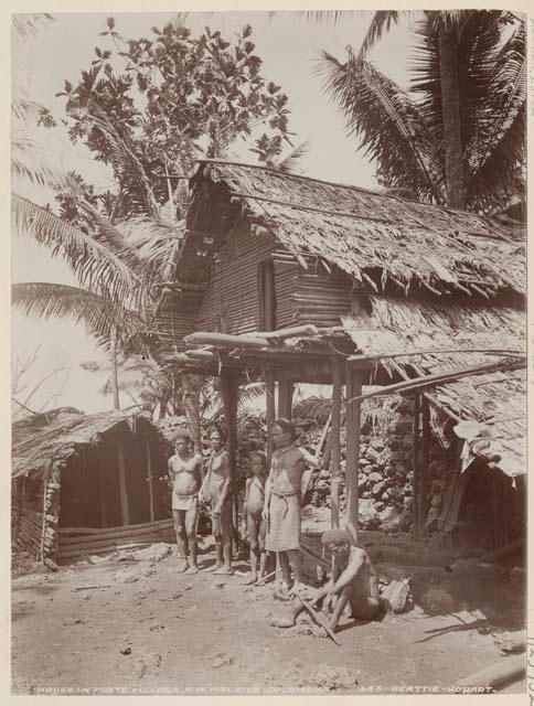 Group standing in front of house at Foate