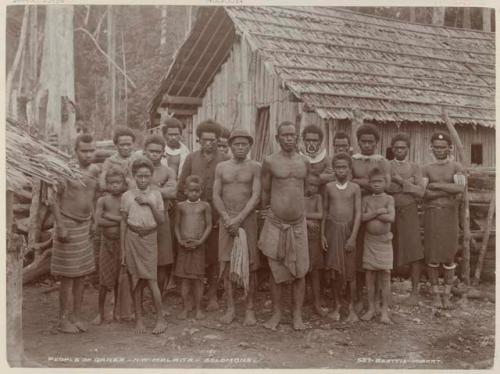 Group standing in front of a building at Qarea