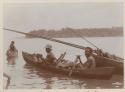 Men of Foate in canoes