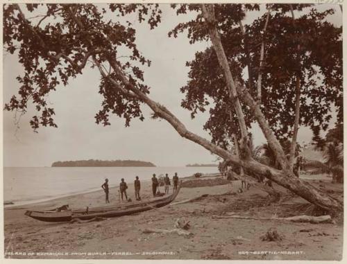 People and canoe on beach at Buala, with Kumaigola Island in background