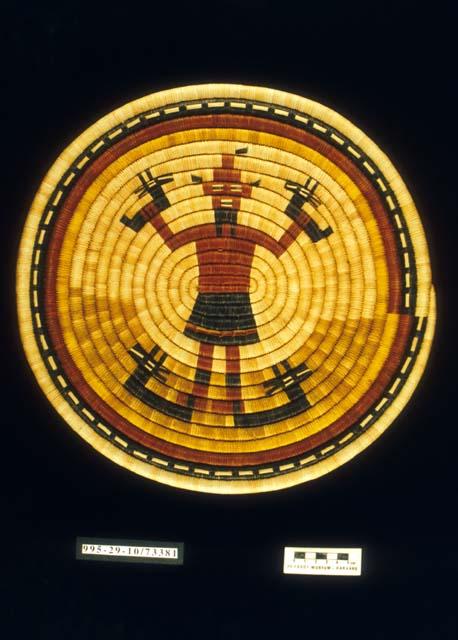 Large coiled circular plaque with Mudhead and deer motif