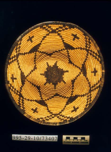 Coiled bowl with cross motif