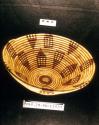 Coiled basketry bowl with flaring sides