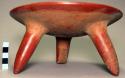 Tripod bowl with plain red paint