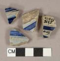 Gray salt glaze and blue lead glaze decorated stoneware vessel body fragment, gray paste, Westerwald type