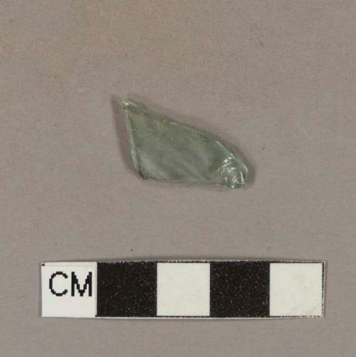 Molded aqua bottle glass fragment