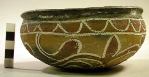 Earthenware bowl with cord-impressed and polychrome designs on exterior and polychrome designs on interior