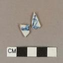 Blue hand painted porcelain body sherds; two sherds crossmend