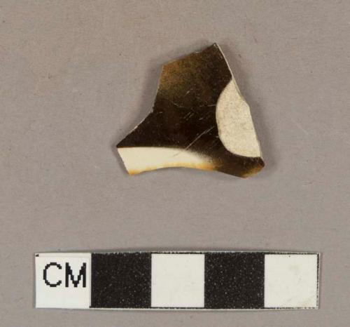 Factory decorated whiteware body sherd