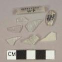 Colorless glass vessel fragments, 1 6-sided tube fragment