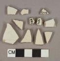 Undecorated white salt-glazed stoneware vessel body fragments, light gray paste