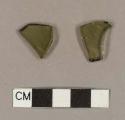 Olive green flat glass fragments; two fragments crossmend