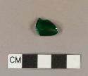 Green bottle glass fragment with layer of white glass