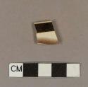 Factory decorated slipware rim sherd